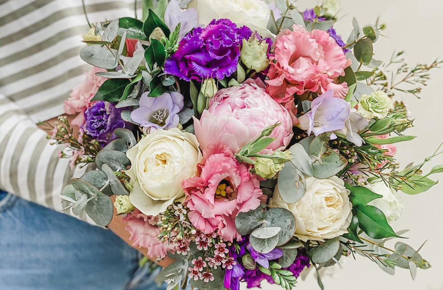 a bouquet of pastel toned flowers