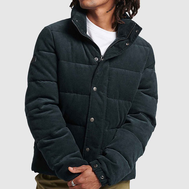 A green cord jacket, one of the best men's puffer jackets. 