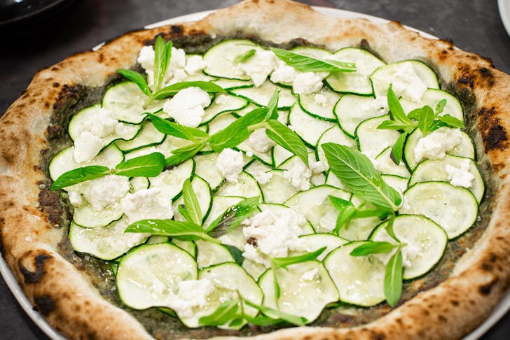 A pizza topped with courgette and feta from Ria Pizza 