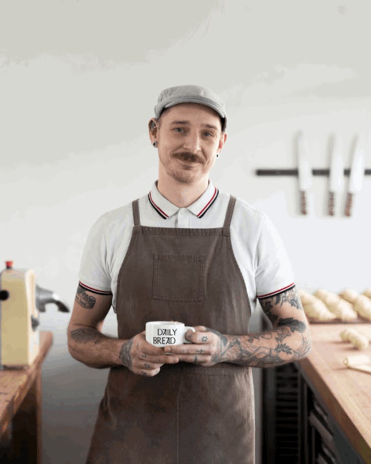 A Daily Bread staffer enjoying the new Daily Blend. 