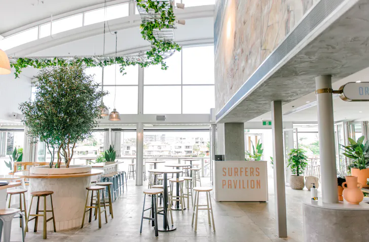 the bright interior of a waterfront venue