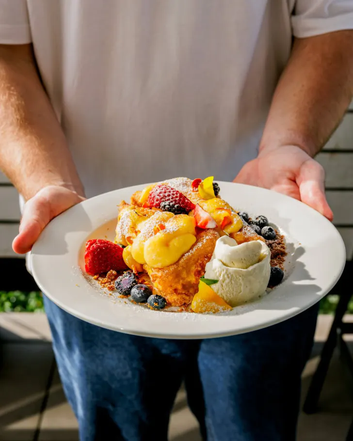 Plate of food in hands