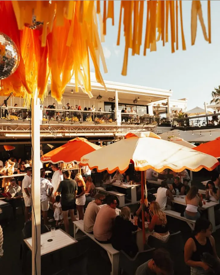 Outdoor area with orange seating