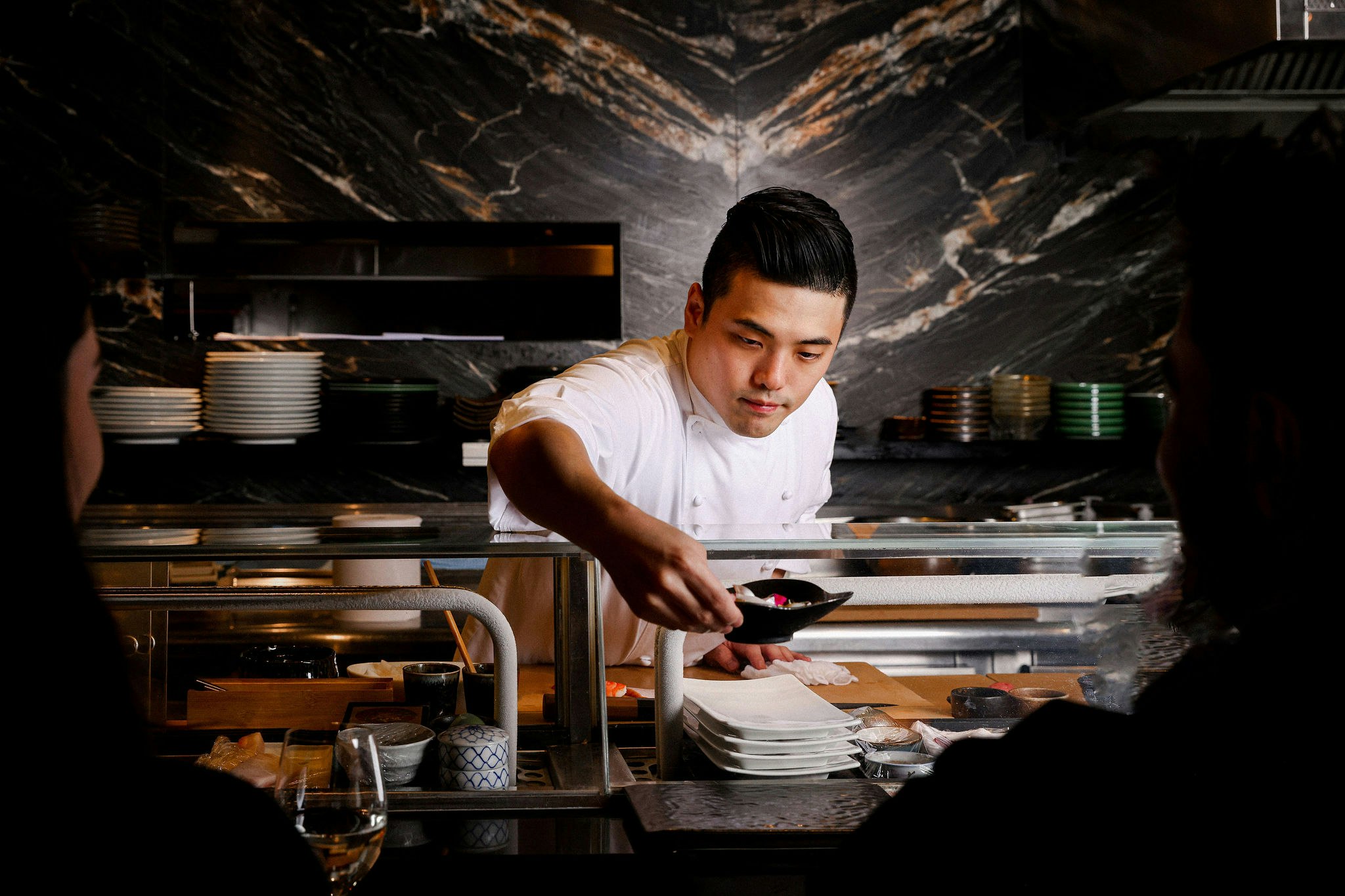 Man presenting food to table