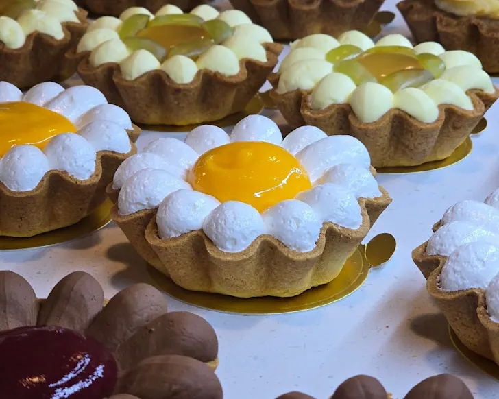 Rows upon rows of flower-shaped gluten-free tarts. 