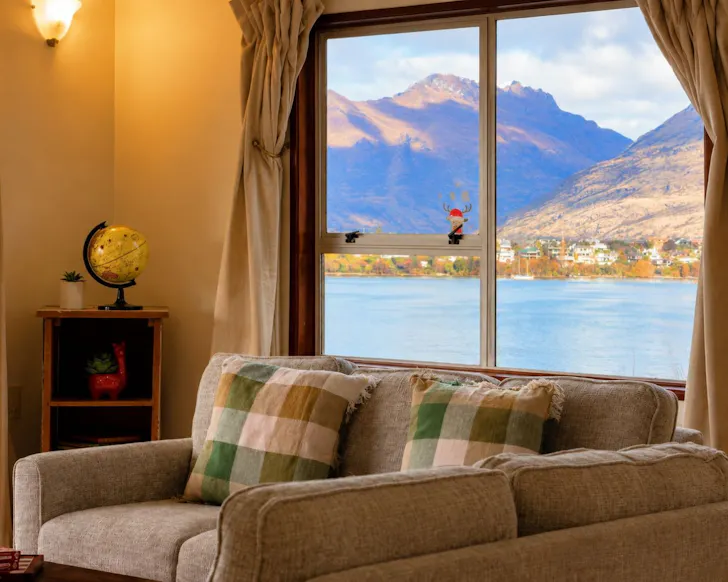 The lake view from the lounge at Taka Lakehouse Airbnb NZ