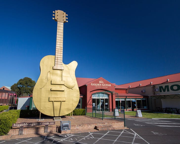 Giant golden guitar statue