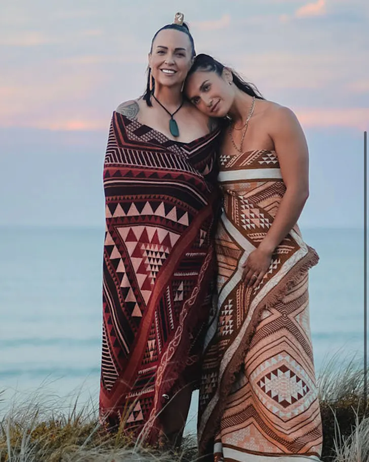 Tania and her daughter Shaianne wear cultural dress. 