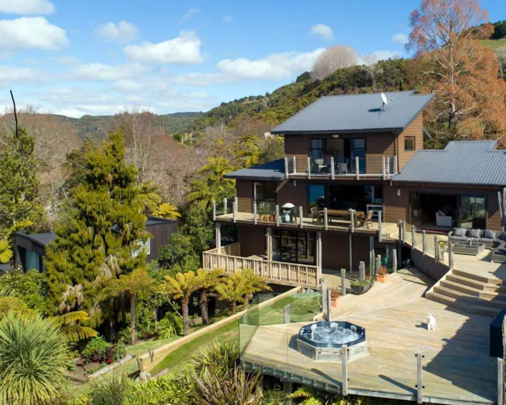 An exterior view of Tarawera Luxury Lakeside best lakefront Airbnbs NZ
