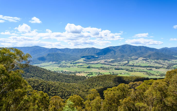 A wide view of a valley and mountain ranges, one of the best hikes in Victoria. 