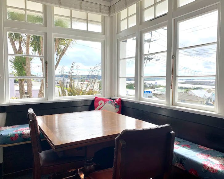 The cute dining nook at Te Whare Poutama, one of the best places to stay in Invercargill.