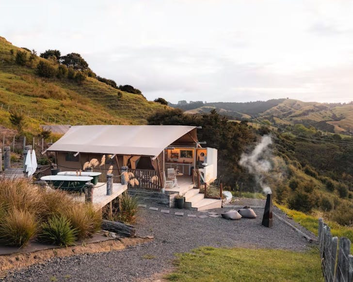 A view of the safari tent at Te Kouma Heights Glamping one of the best Airbnbs in New Zealand