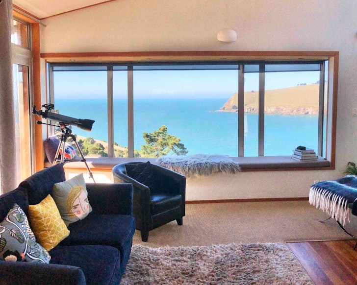 The sea view from the living space at Te Onepoto Lodge best Christchurch Airbnbs