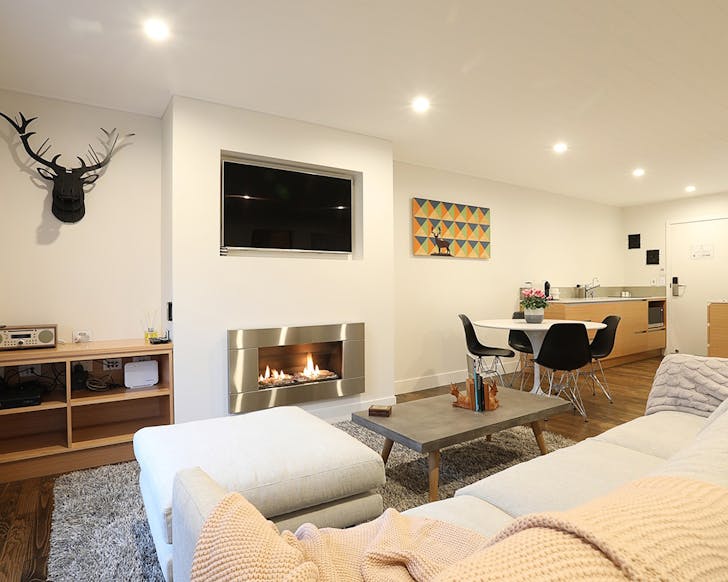 A well-appointed sitting room at The Lodges at Transport World in Invercargill.