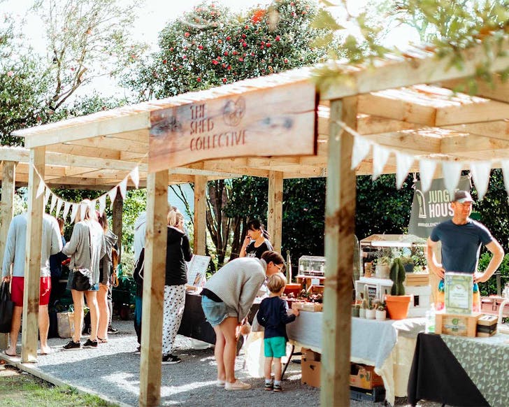 People look at the stalls at The Shed Collective in Oratia.