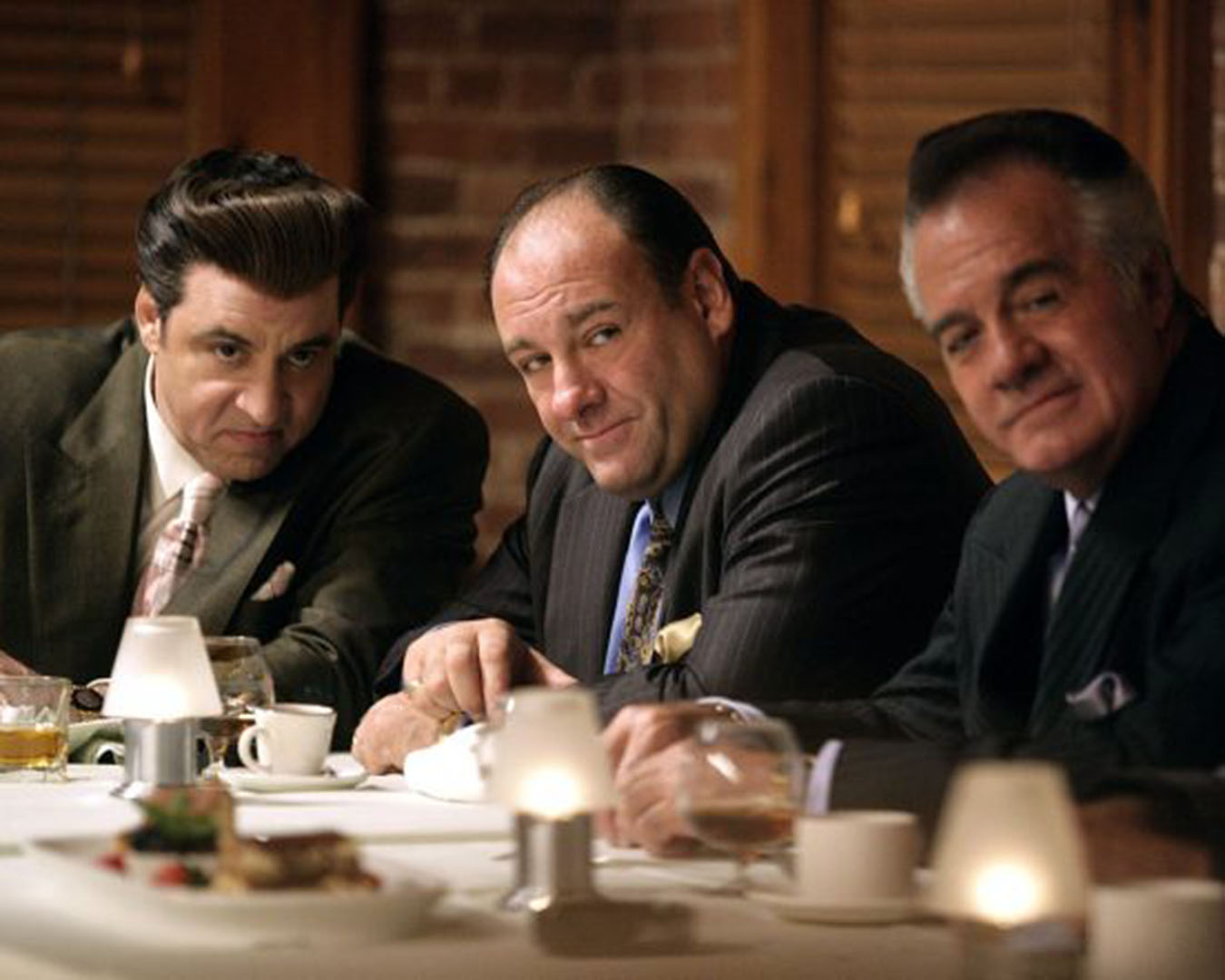Tony Soprano and his made men sit down to dinner.