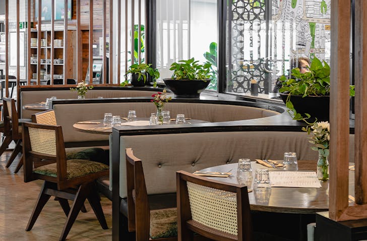Three circle booth-style dining room set ups at The Victoria Hotel that's hosting Mummy Brunch for Mother's Day in Melbourne