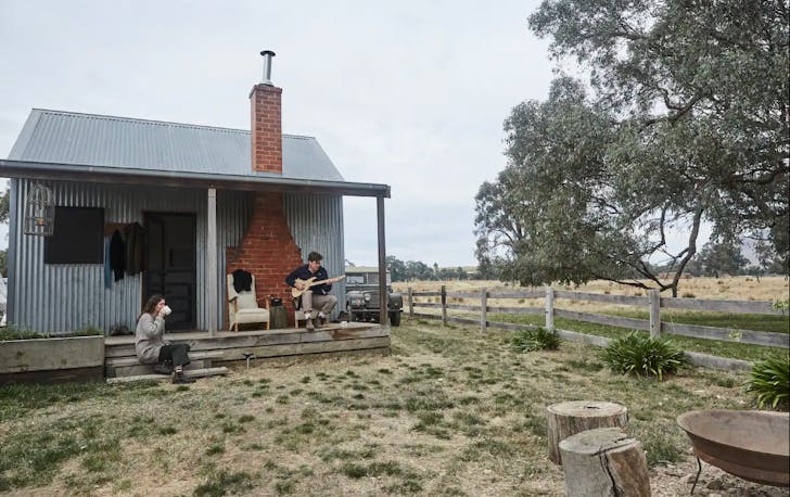 A converted shed with people on the balcony. A best farm stay in Victoria contender 