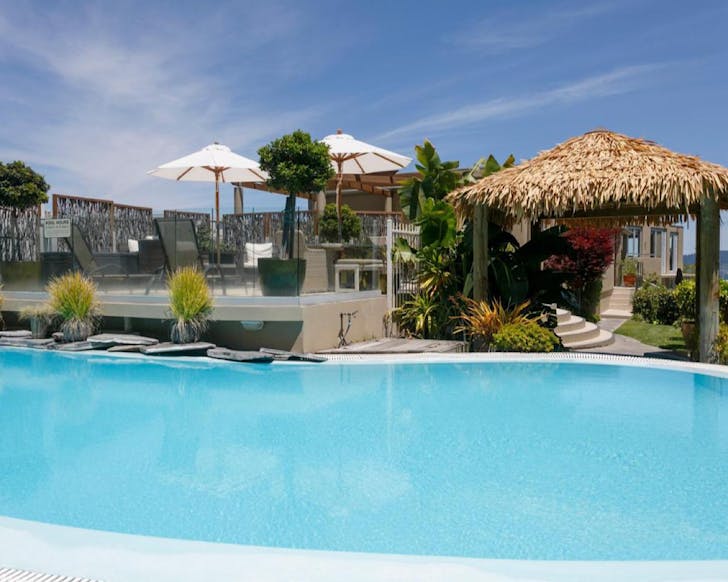 A Fiji-reminiscent pool and poolside bouree number at The Reef Resort, one of the best motels in TaupÅ.
