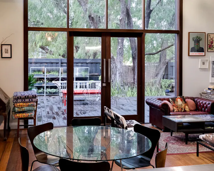The living space with a garden view at The Bach best Busselton Airbnbs