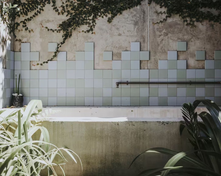 A view of the outdoor bath at The Banksia House Airbnb Sunshine Coast