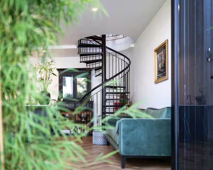 The black spiral staircase at The Barn short term stay in Paddington Sydney