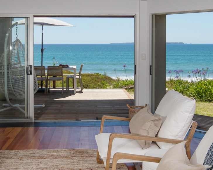 The sea view from the living space at The Beach House best NZ beach house Airbnbs