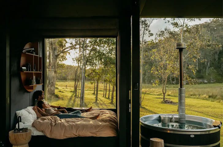 A view of the bedroom at Billy's Hideawau Airbnb with hot tub spa bath in NSW