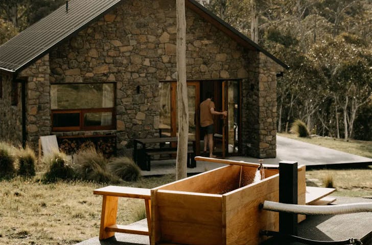 A n exterior view of Mill Cabin Airbnb with hot tub spa bath in NSW