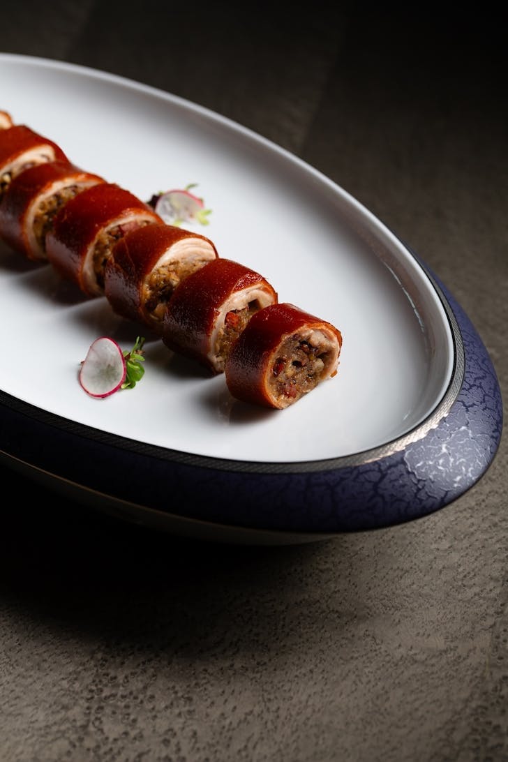 Crispy Roasted Pig Stuffed with XO Glutinous Rice from The Black Pearl