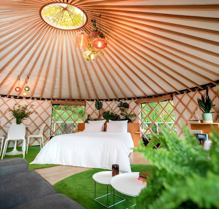 The wooden interior of the Black Yurt one of the best Airbnbs in New Zealand