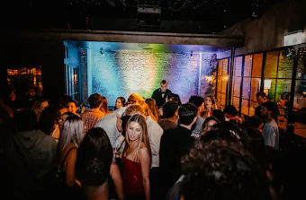 A dance floor is packed. 