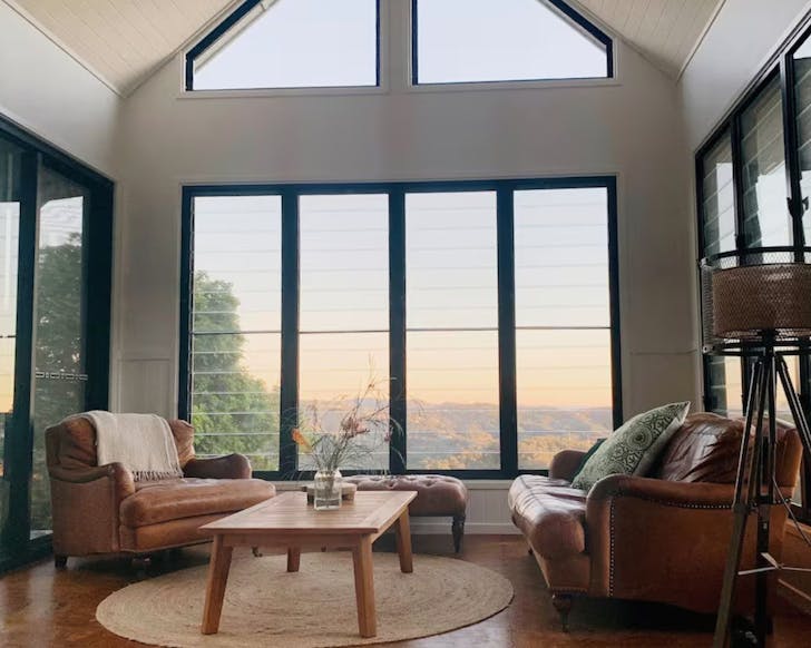 The huge windows in the living space at the Coffee Roasting Shed pet friendly Airbnb Gold Coast
