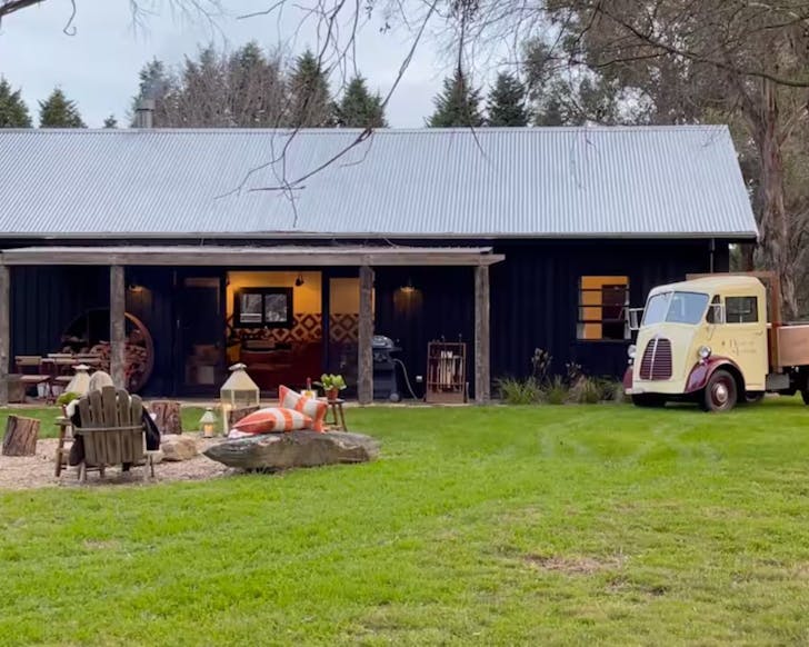 The firepit at The Cottage @ Leceister Park cabin NSW with a vintage van outside 