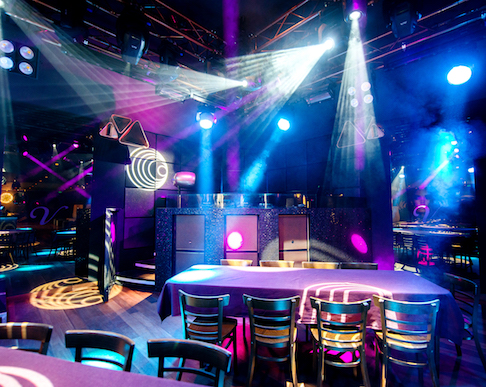 Fun party in modern nightclub with illuminated multi colored decoration  generated by AI 24891810 Stock Photo at Vecteezy