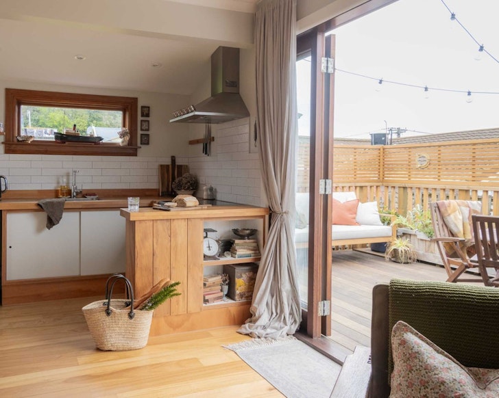 The kitchen and deck at The Daughter's Anchorage best pet-friendly stays New Zealand