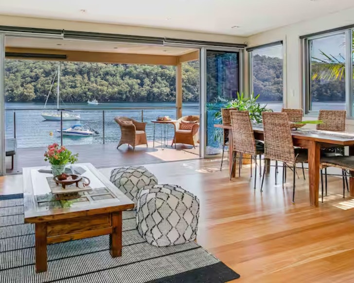 The living space looking out to the water at The Deckhouse Airbnb Hawkesbury River