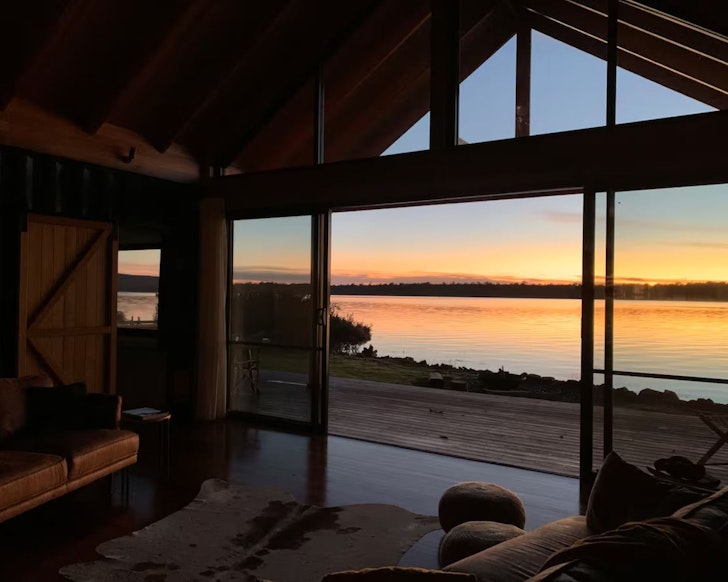 A view of the lake out the window of The Doctor's House one of the best Airbnbs in Tasmania