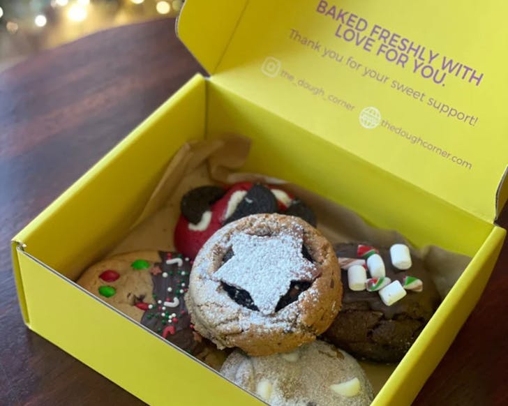 A Christmas mince pie in a yellow box. 