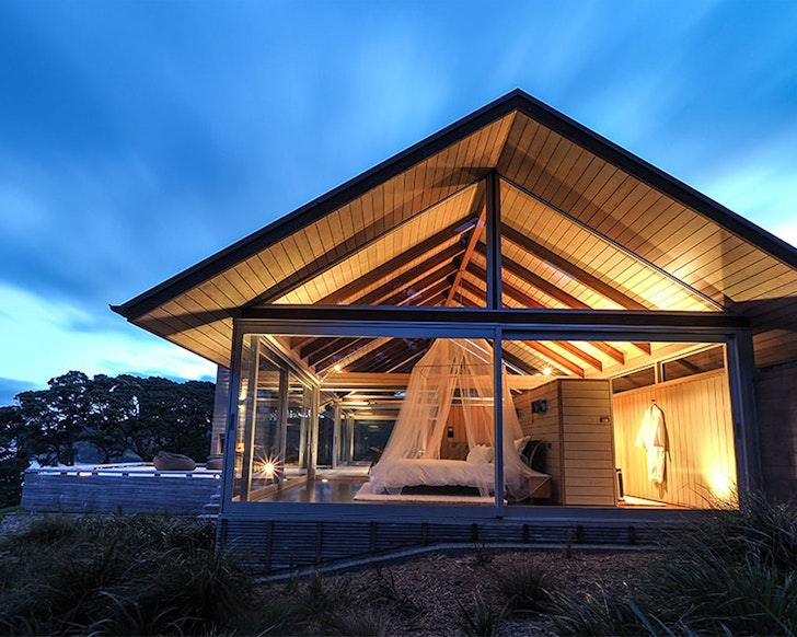 The Glasshouse at dusk, one of the best romantic stays near Auckland