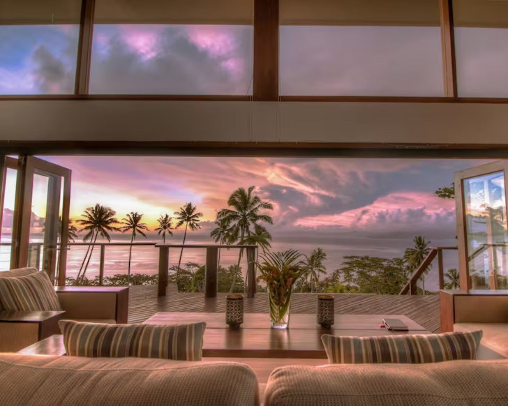 A view of the water from the living space at The Grand Villa Fiji