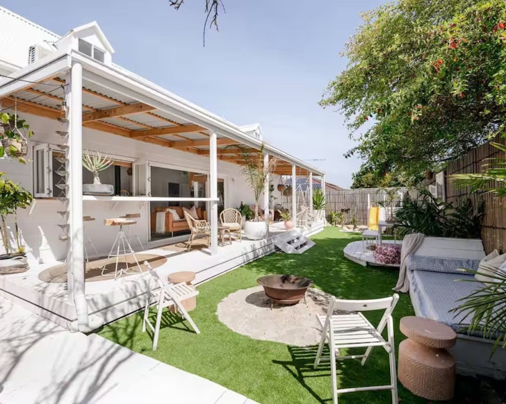 A view of the verandah and garden at The Hideaway one of the best kid-friendly Airbnbs in Australia