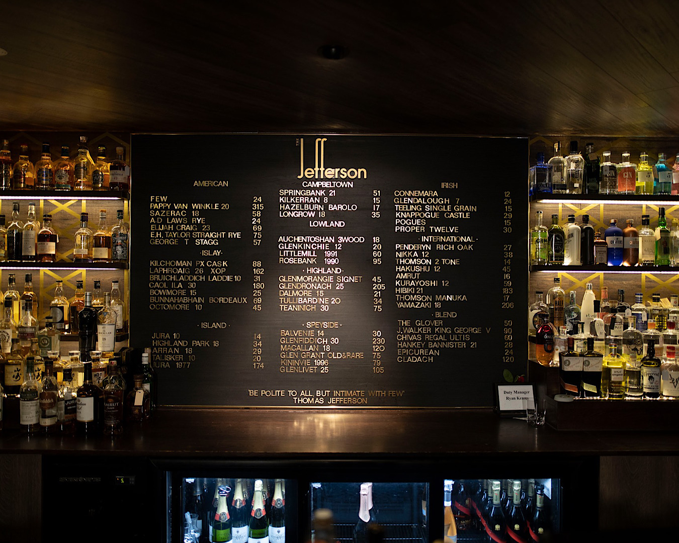 A wall of whisky and the full menu at The Jefferson. 
