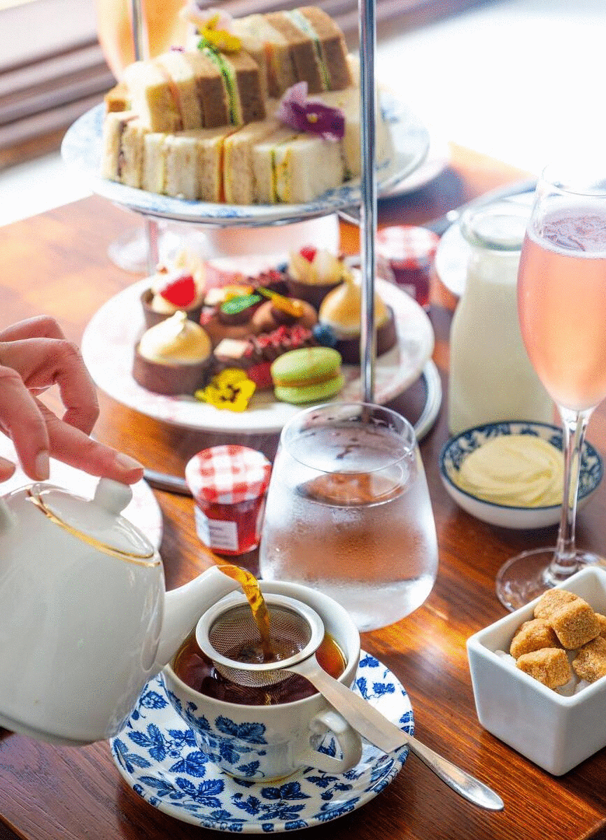 A delicious high tea set up of sweet and savoury eats.