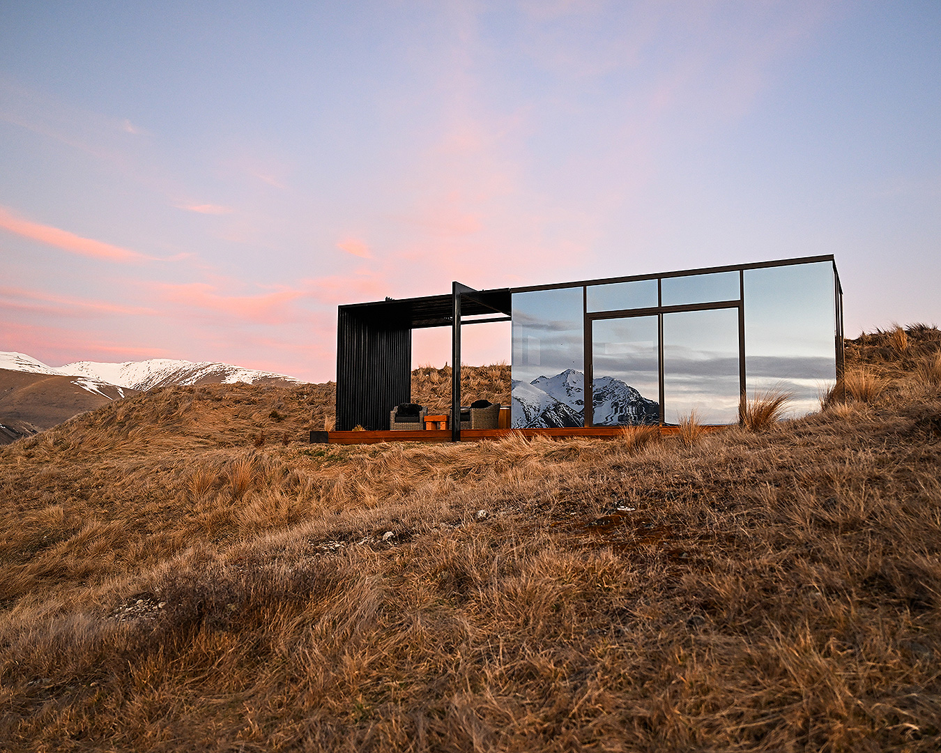 Incredible glass tiny home perched on a hill. 