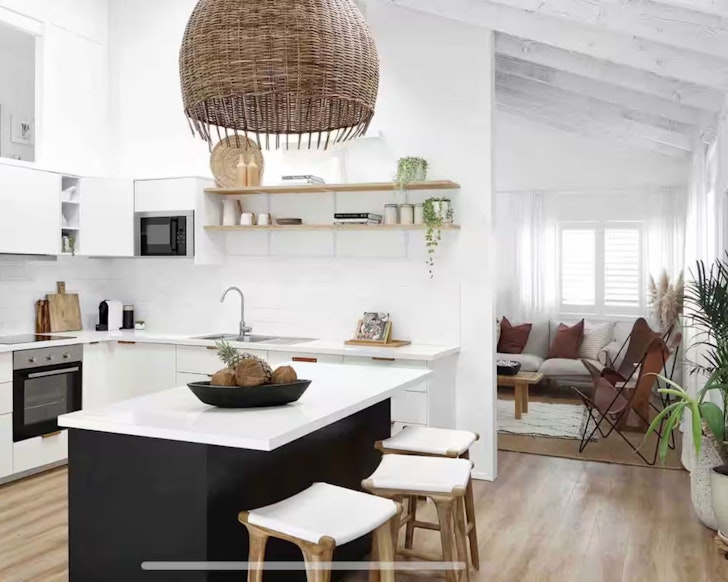 The kitchen and living space at The Lodge one of the best Noosa Airbnbs