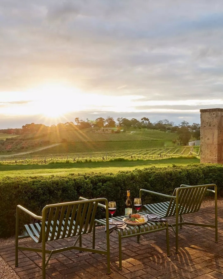 Two chairs overlooking the vines at The Louise one of the best hotels in Australia