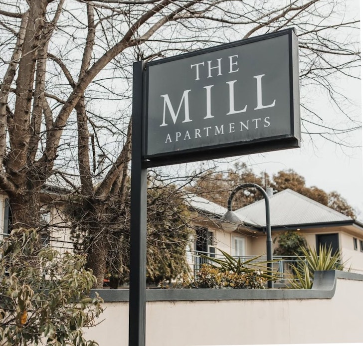 A view of the Mill Apartments Clare Valley accommodation with the sign outside 