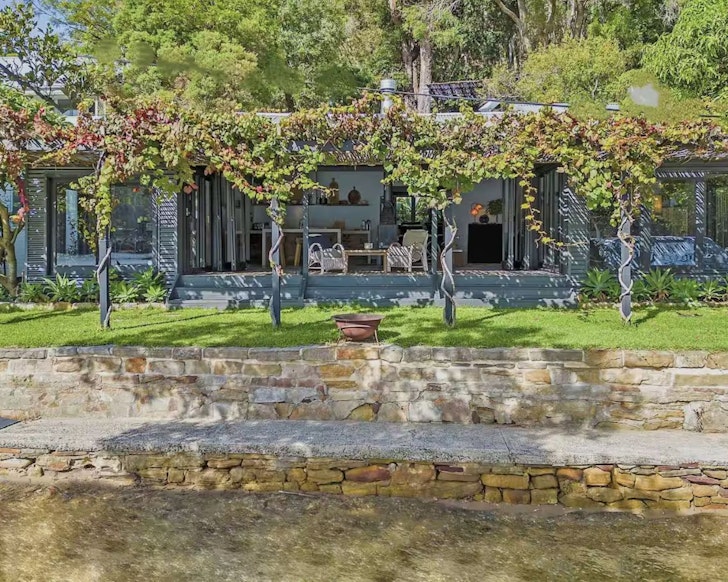 The vine covered verandah by the water at The Milson Airbnb on the Hawkesbury River