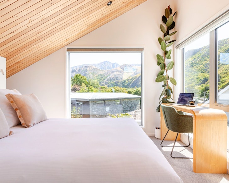 The mountain view from the bedroom at The Miners Hut best romantic New Zealand stays